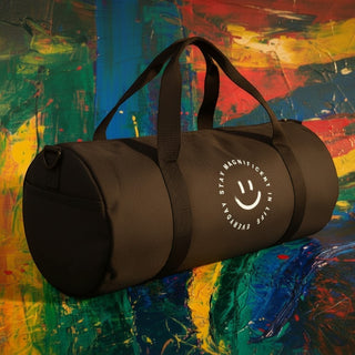 My Store H2Elite heavyweight cotton canvas duffel bag in dark brown with a white circular smiley face graphic.