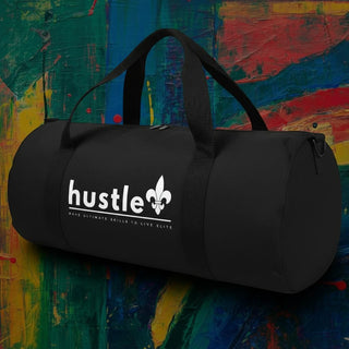 My Store black heavyweight cotton canvas duffel bag with white Hustle graphic print against a colorful abstract background