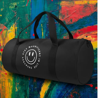 My Store H2Elite heavyweight black cotton canvas duffel bag with a white smiley face graphic against a colorful background