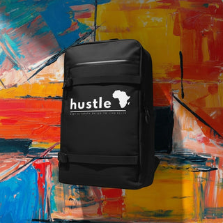 My Store H2Elite recycled black backpack with front board straps, YKK zip pocket, and white Hustle graphic print.