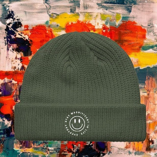 My Store olive green fisherman beanie with a white smiley face logo, featuring a wide ribbed knit acrylic design.