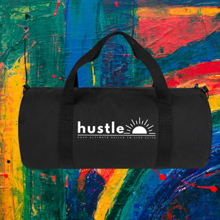 My Store H2Elite heavyweight black cotton canvas duffel bag with white Hustle graphic against abstract art background.
