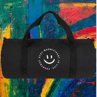 My Store H2Elite heavyweight black cotton canvas duffel bag with a white SMILE graphic on a colorful abstract background