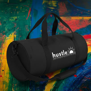 My Store H2Elite heavyweight black cotton canvas duffel bag with white Hustle graphic, featuring carry handles and strap.