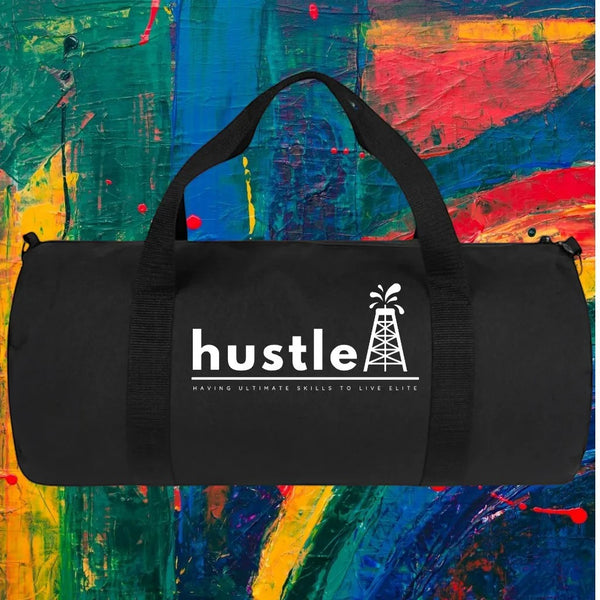 My Store H2Elite heavyweight black cotton canvas duffel bag with white Hustle graphic against abstract art background.