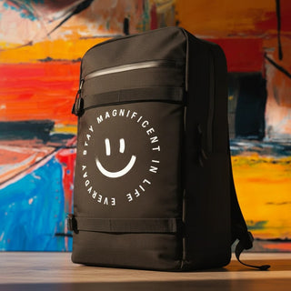 My Store H2Elite recycled black backpack with front board straps, YKK zip pocket, and Stay Magnificent graphic print.